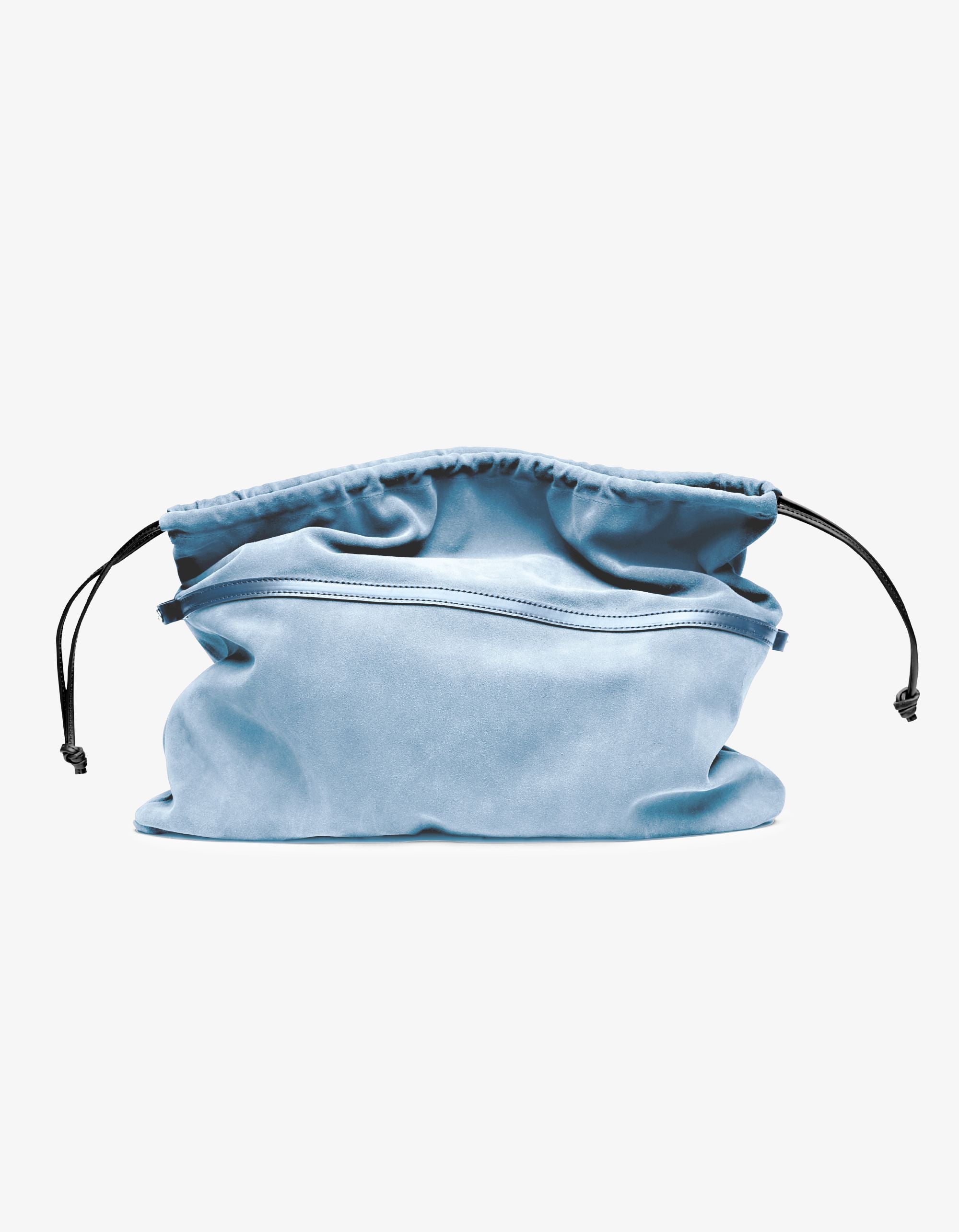 Sky Gigi pouch featuring NYC-made craftsmanship, Italian suede construction, and removable drawstring liner