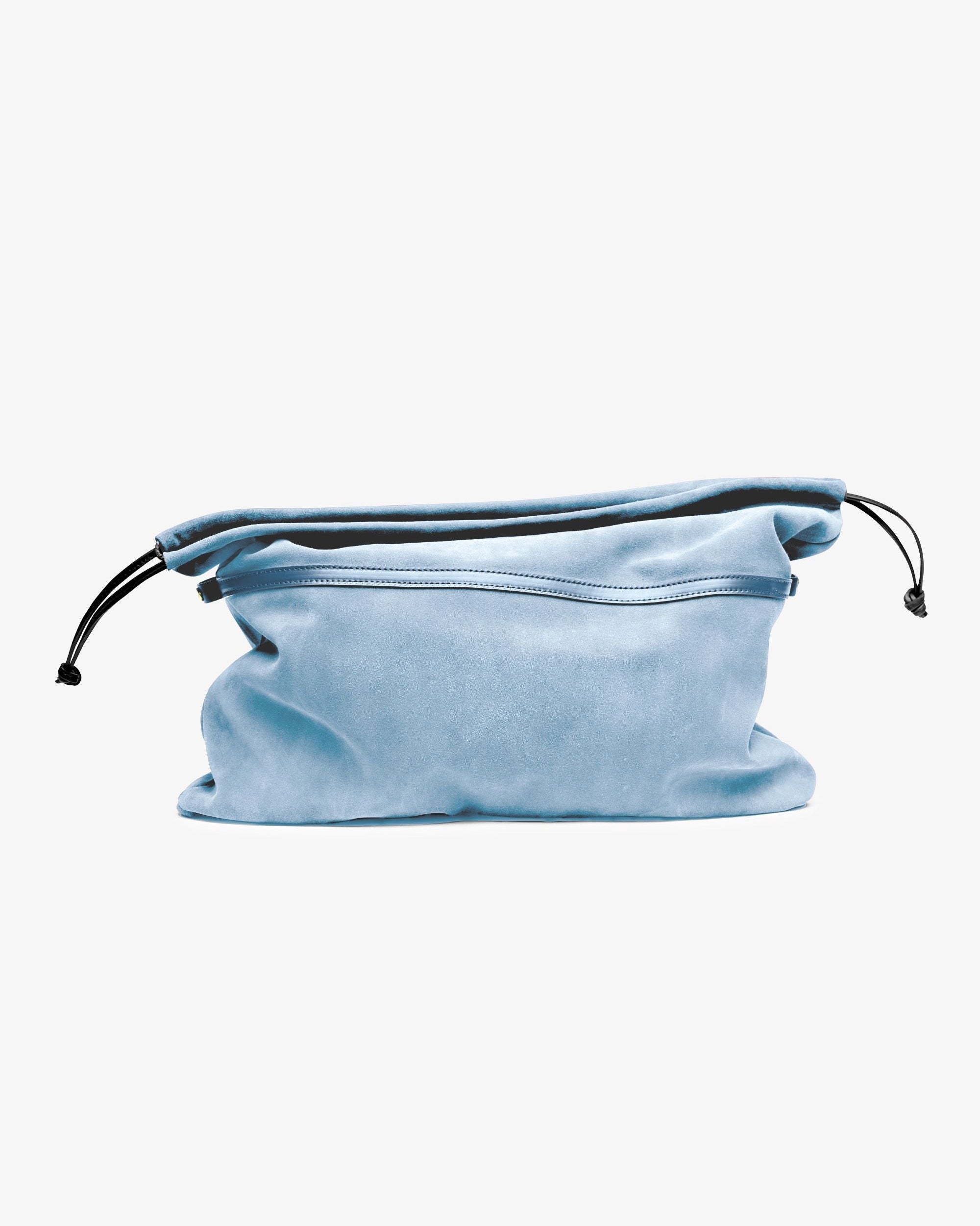 Gigi pouch in sky Italian suede, handmade in NYC, with drawstring closure and soft suede interior