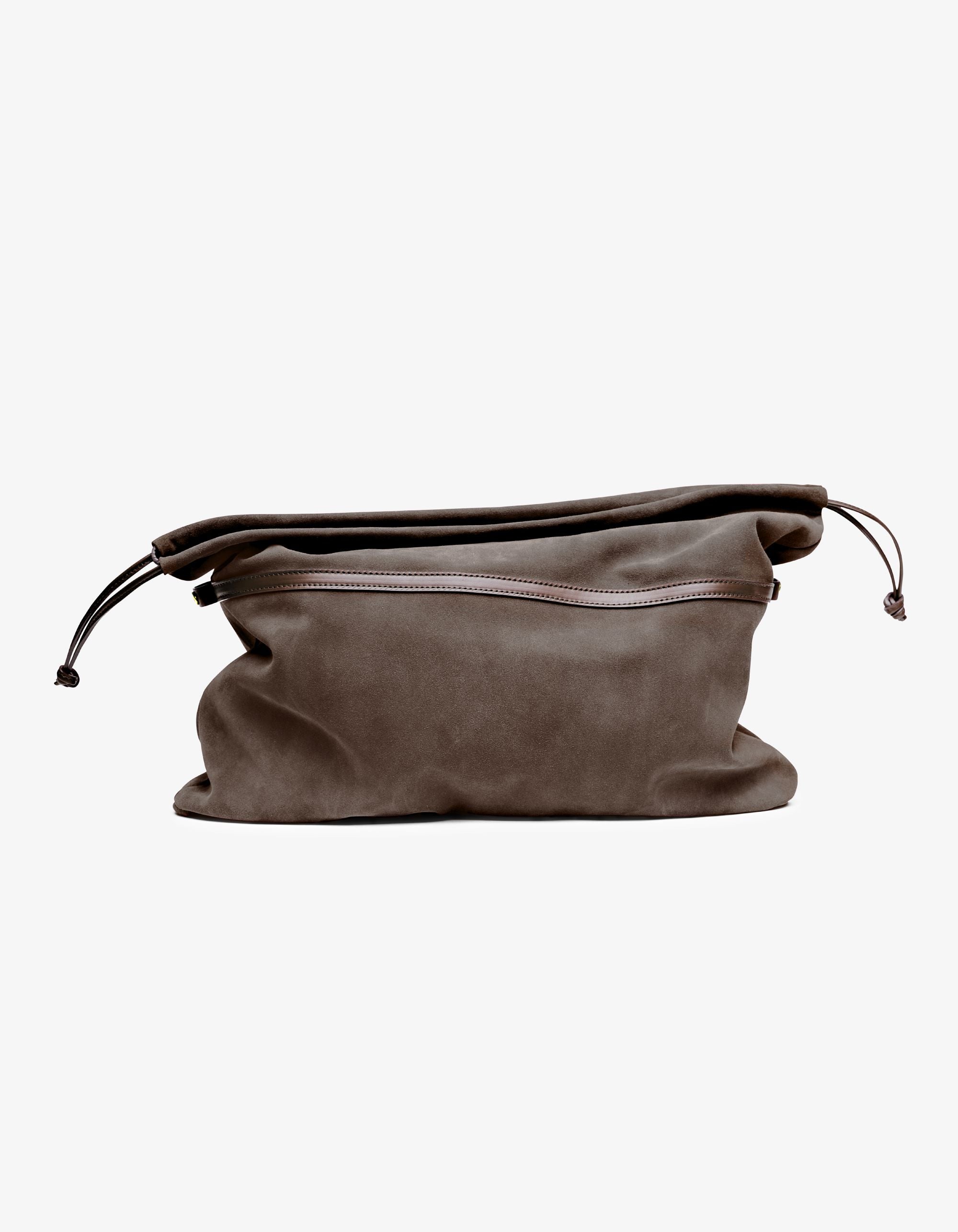 Gigi pouch in taupe Italian calfskin leather, handmade in NYC, with suede-backed interior and drawstring closure