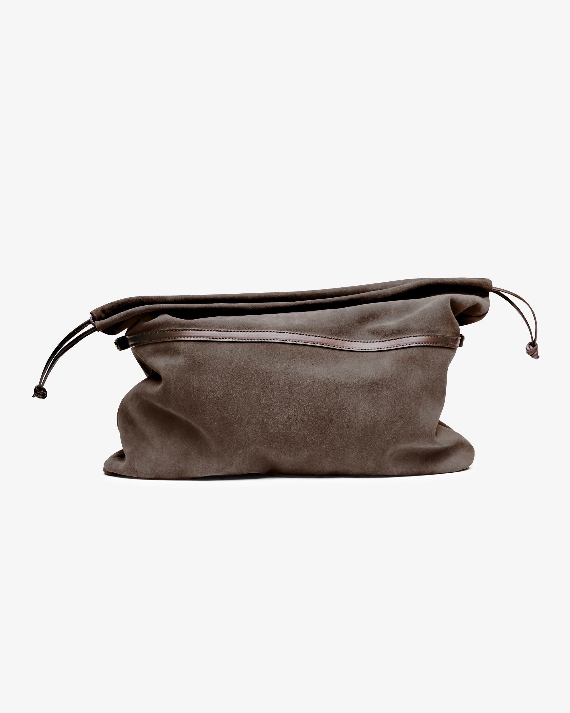 Gigi pouch in taupe Italian calfskin leather, handmade in NYC, with suede-backed interior and drawstring closure