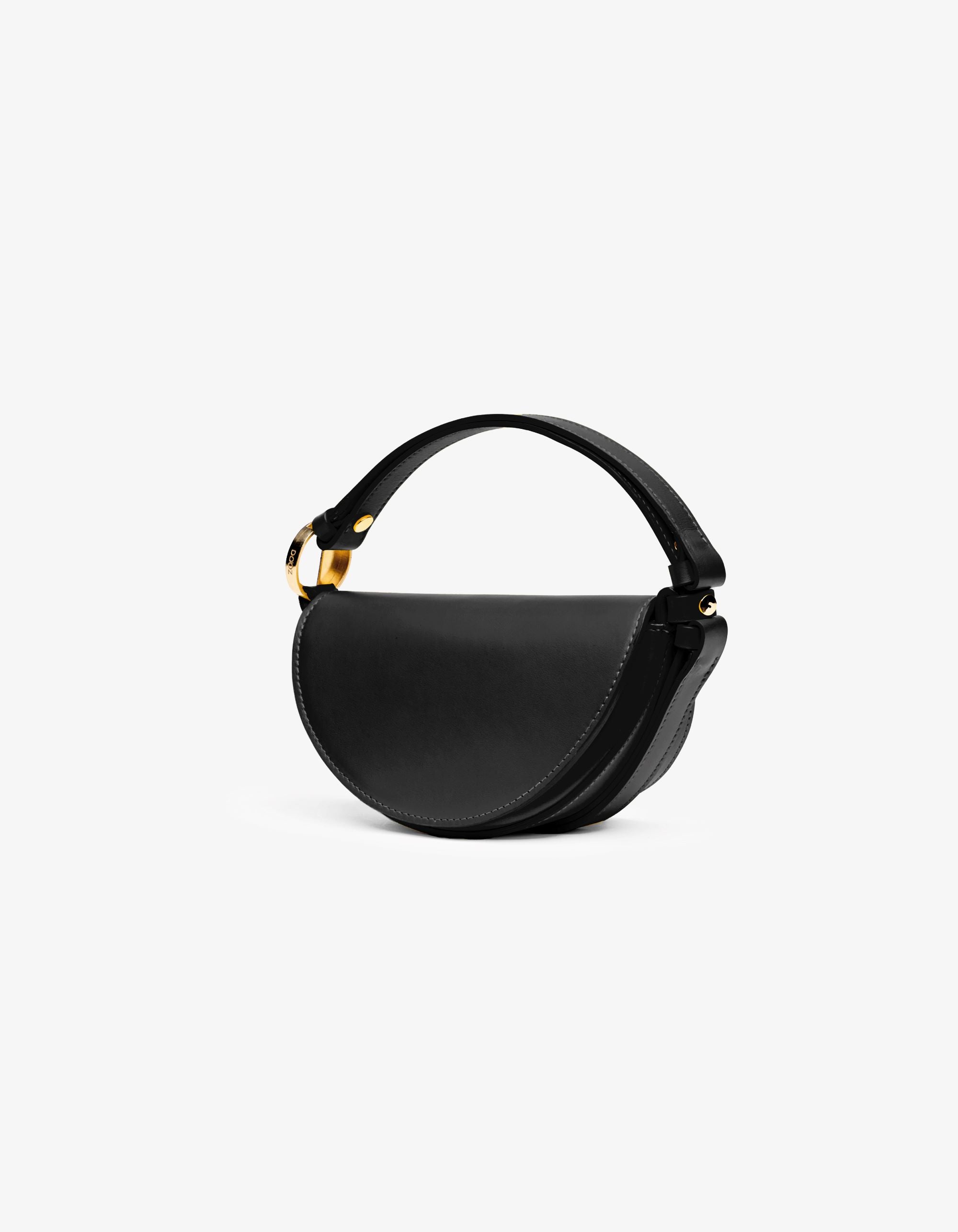 Mini Celeste handbag in classic black Italian calfskin leather, featuring structured design and gold logo hardware