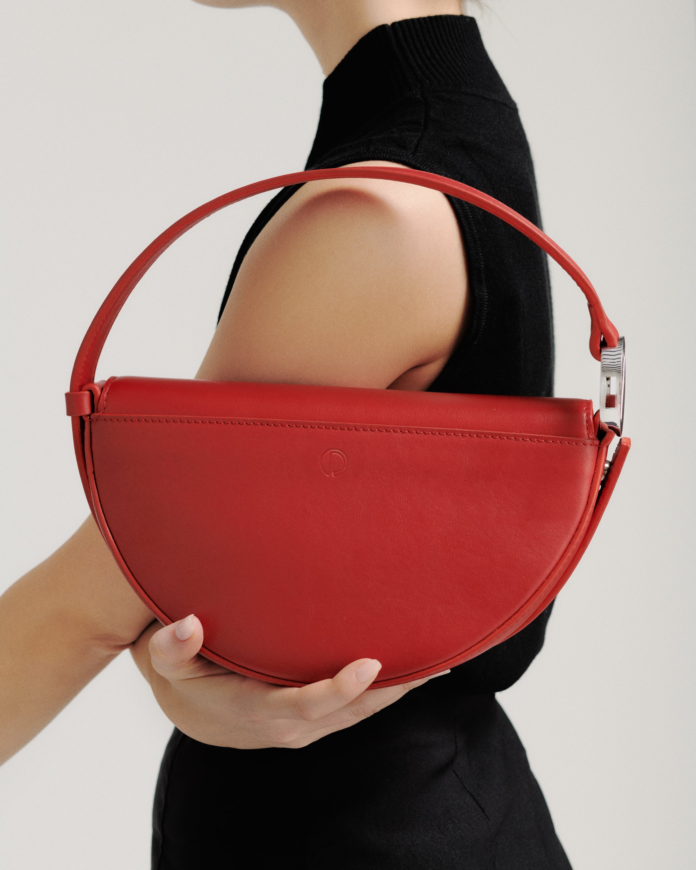 Dooz Celeste Bag in red with back pocket and embossed logo