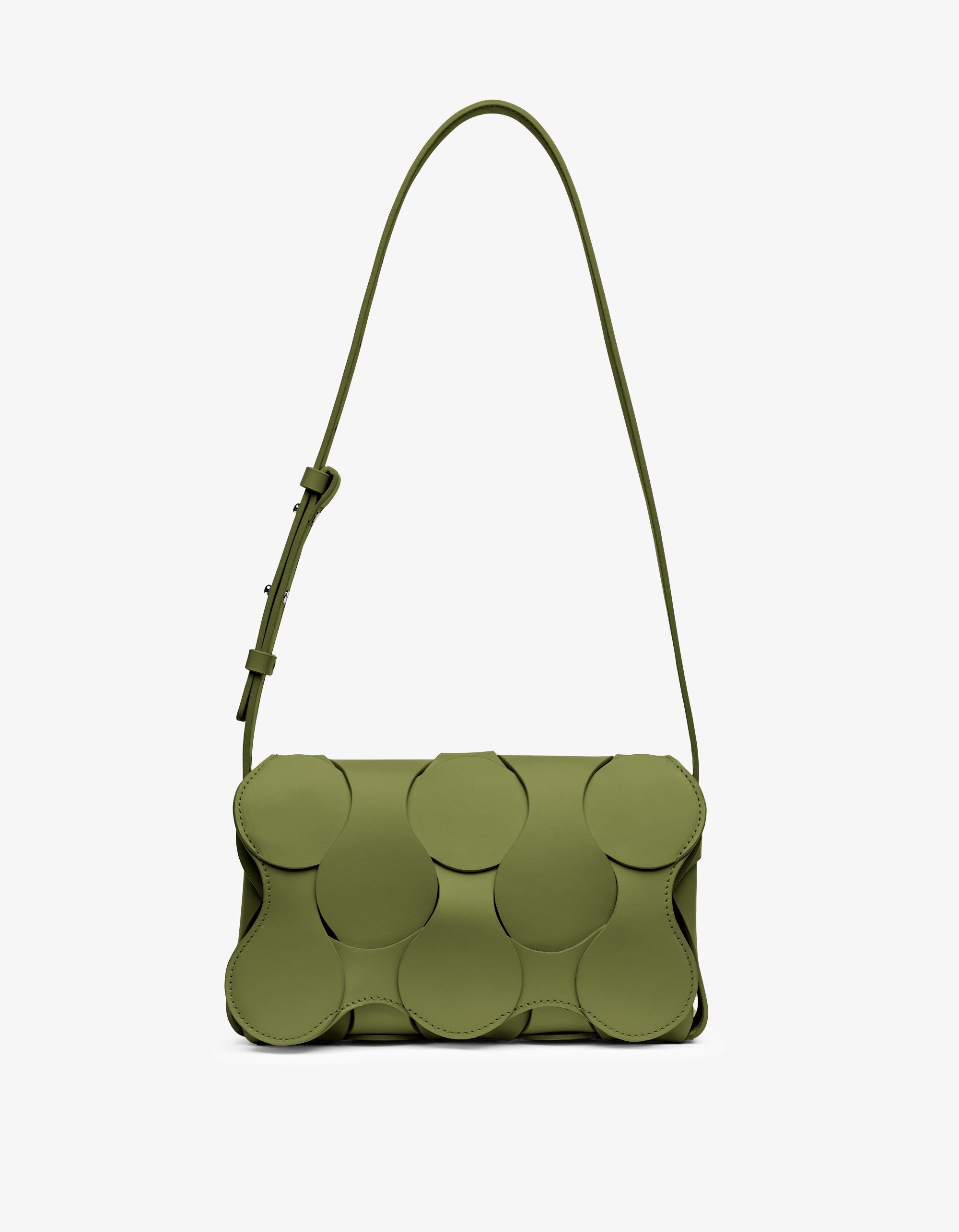 Elegant moss Gigi bag with woven circular motif, magnetic flap closure, and convertible shoulder or crossbody strap, NYC-made