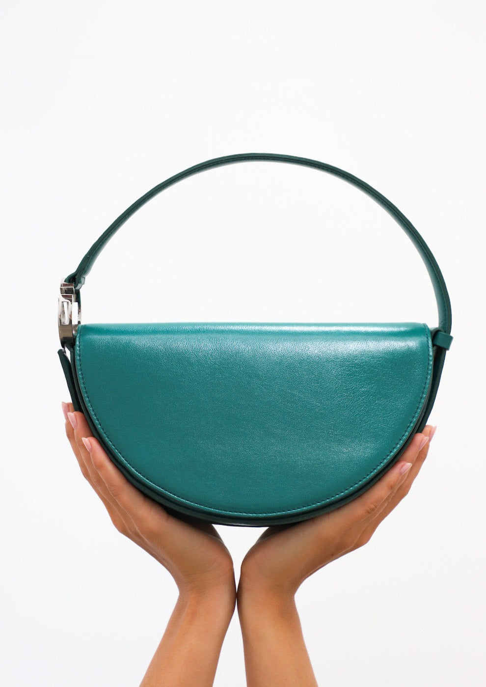 Dooz taurus celeste bag emerald green leather handbag half moon shape architectural design
