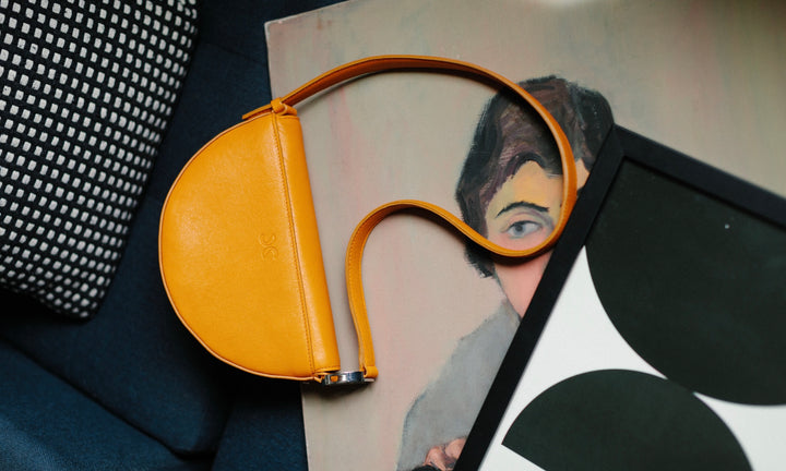 Dooz Gemini golden yellow leather handbag with extended strap