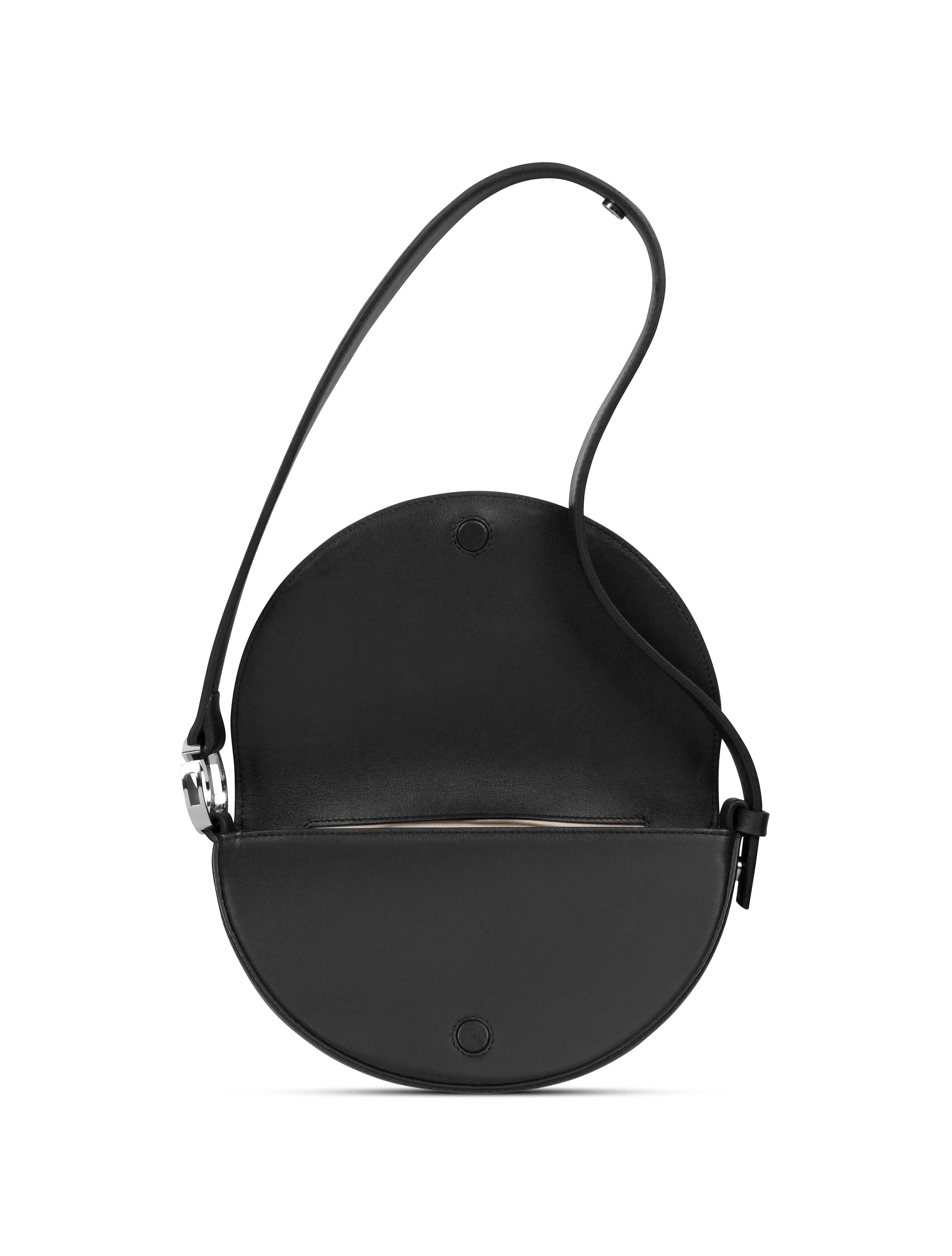 Dooz Celeste Bag made in LA, interior features covered magnetic closure, extendable shoulder strap and interior pocket detail