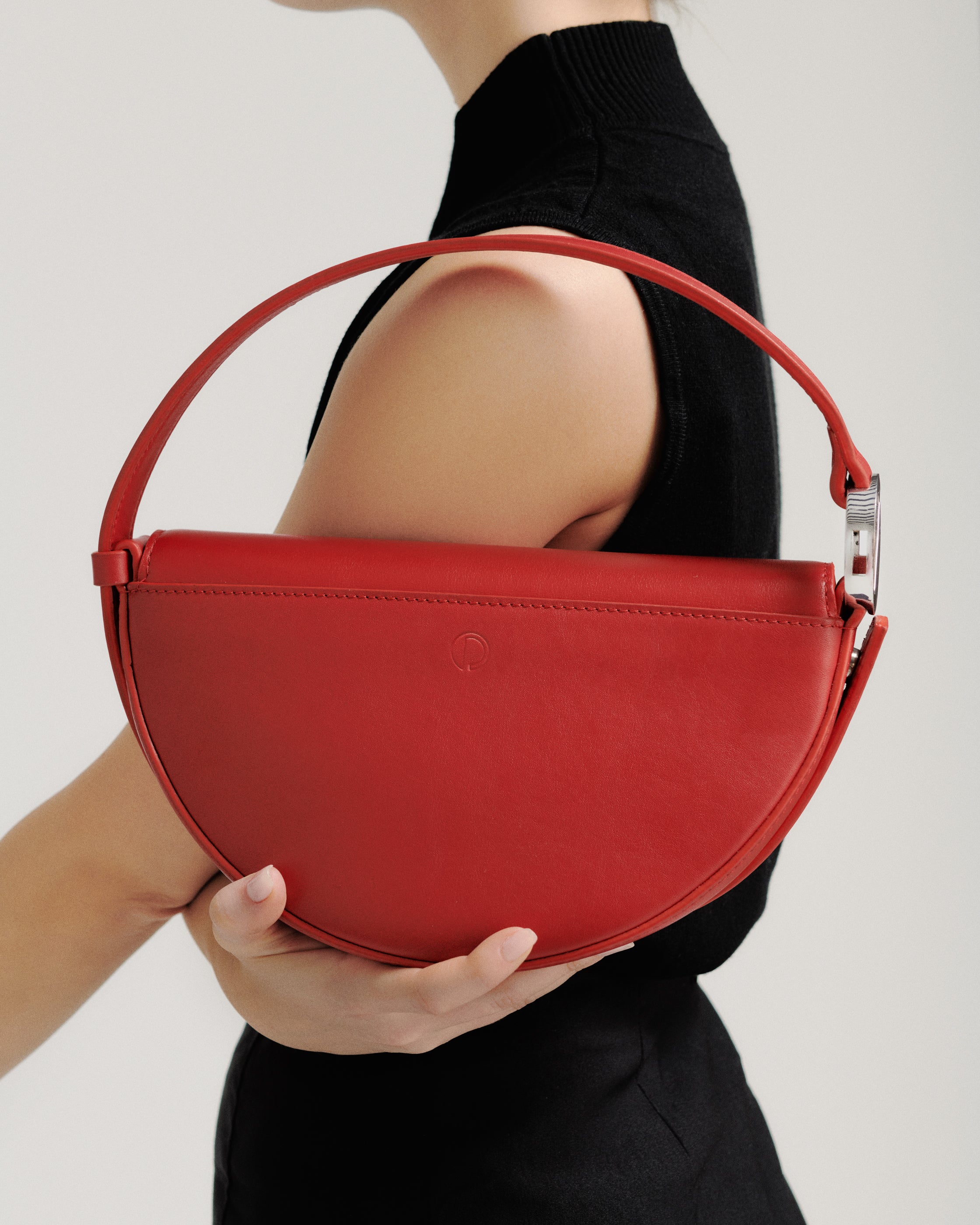 Dooz Celeste Bag in red with back pocket and embossed logo 