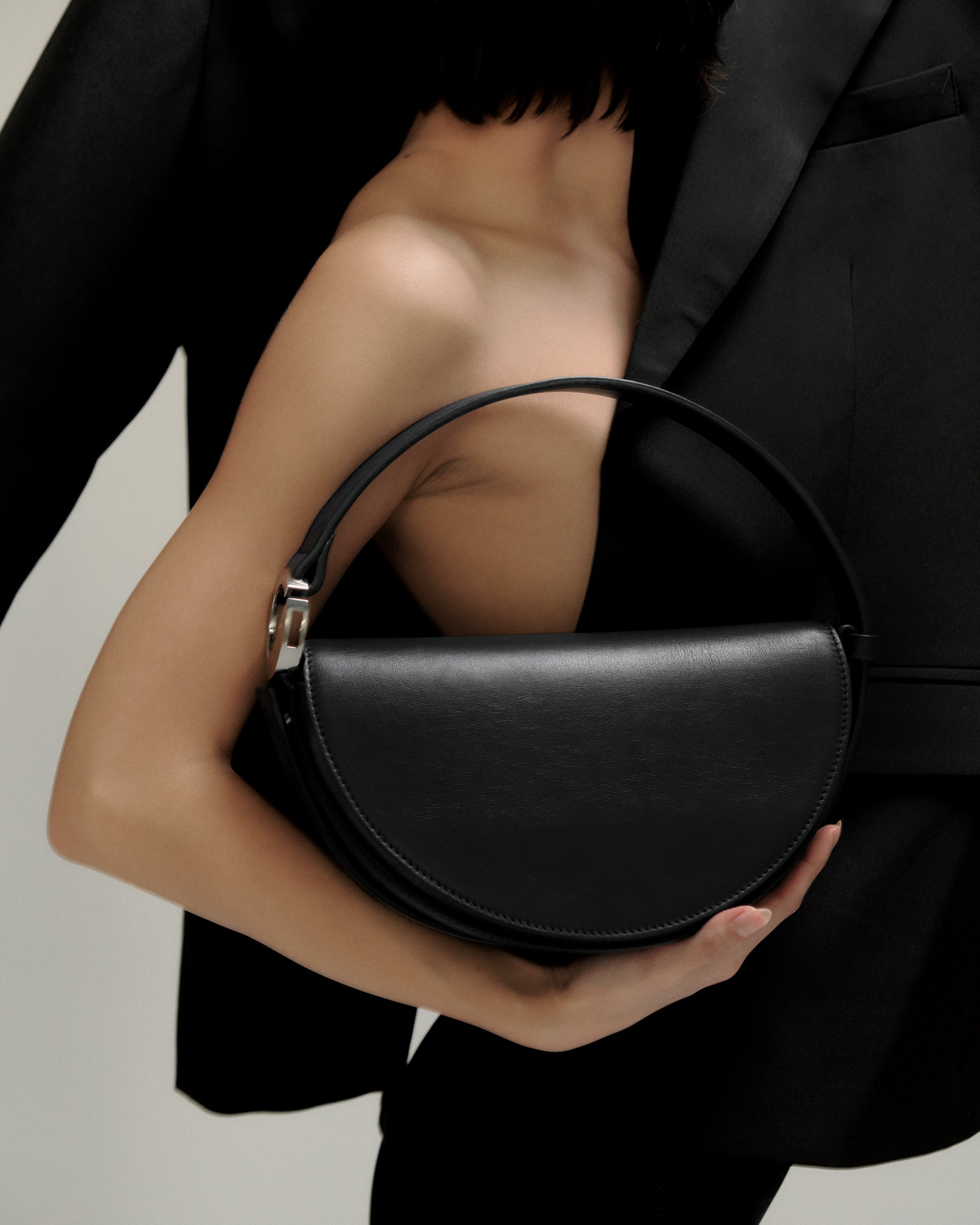 Dooz Celeste bag half moon shape in black Italian Nappa leather