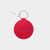 Dooz Aries red leather keychain with embossed logo and silver keyring