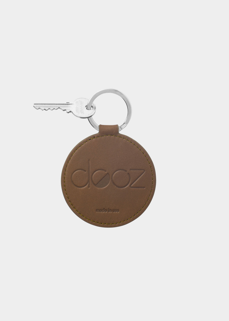 Dooz Capricorn olive green leather keychain with embossed logo and silver keyring