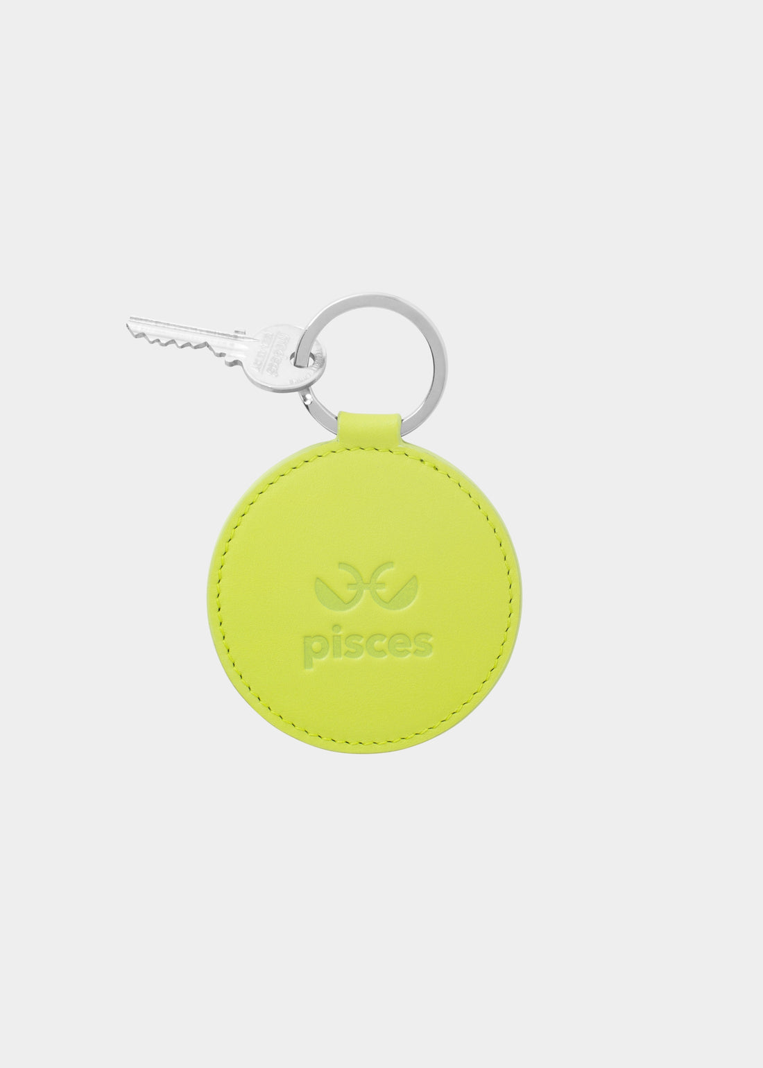 Dooz Pisces lime green keychain with embossed zodiac glyph and silver keyring