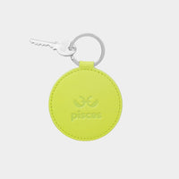 Dooz Pisces lime green keychain with embossed zodiac glyph and silver keyring
