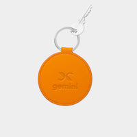 Dooz Gemini golden leather keychain with embossed zodiac glyph and silver keyring