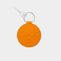 Dooz Gemini golden leather keychain with embossed logo and silver keyring