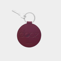 Dooz Virgo burgundy leather keychain with embossed logo and silver keyring