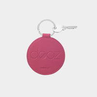 Dooz Sagittarius fuchsia pink leather keychain with embossed logo and silver keyring