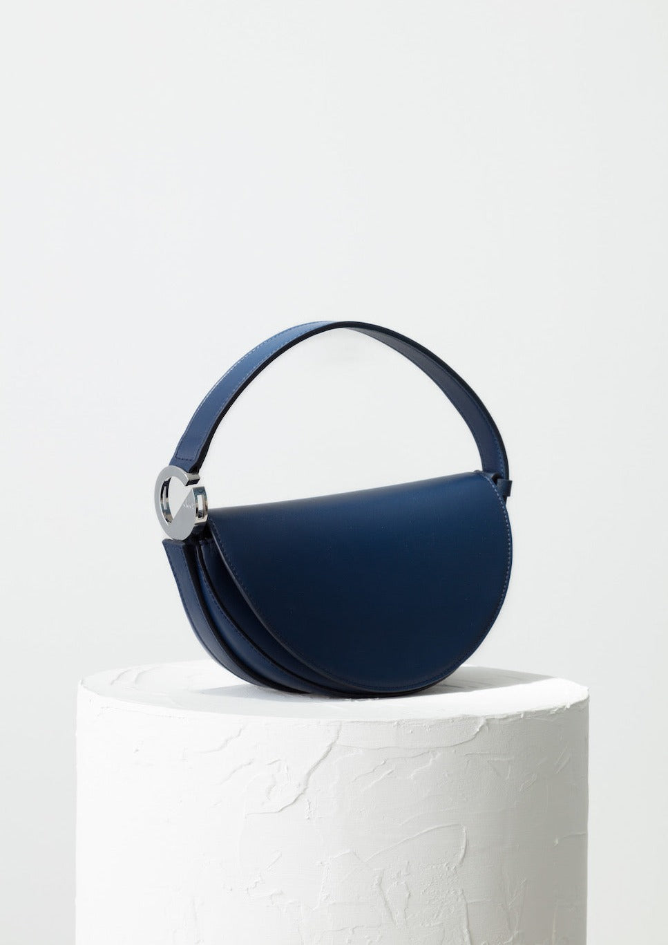 Dooz Scorpio navy leather half moon handbag with short strap and front magnetic flap