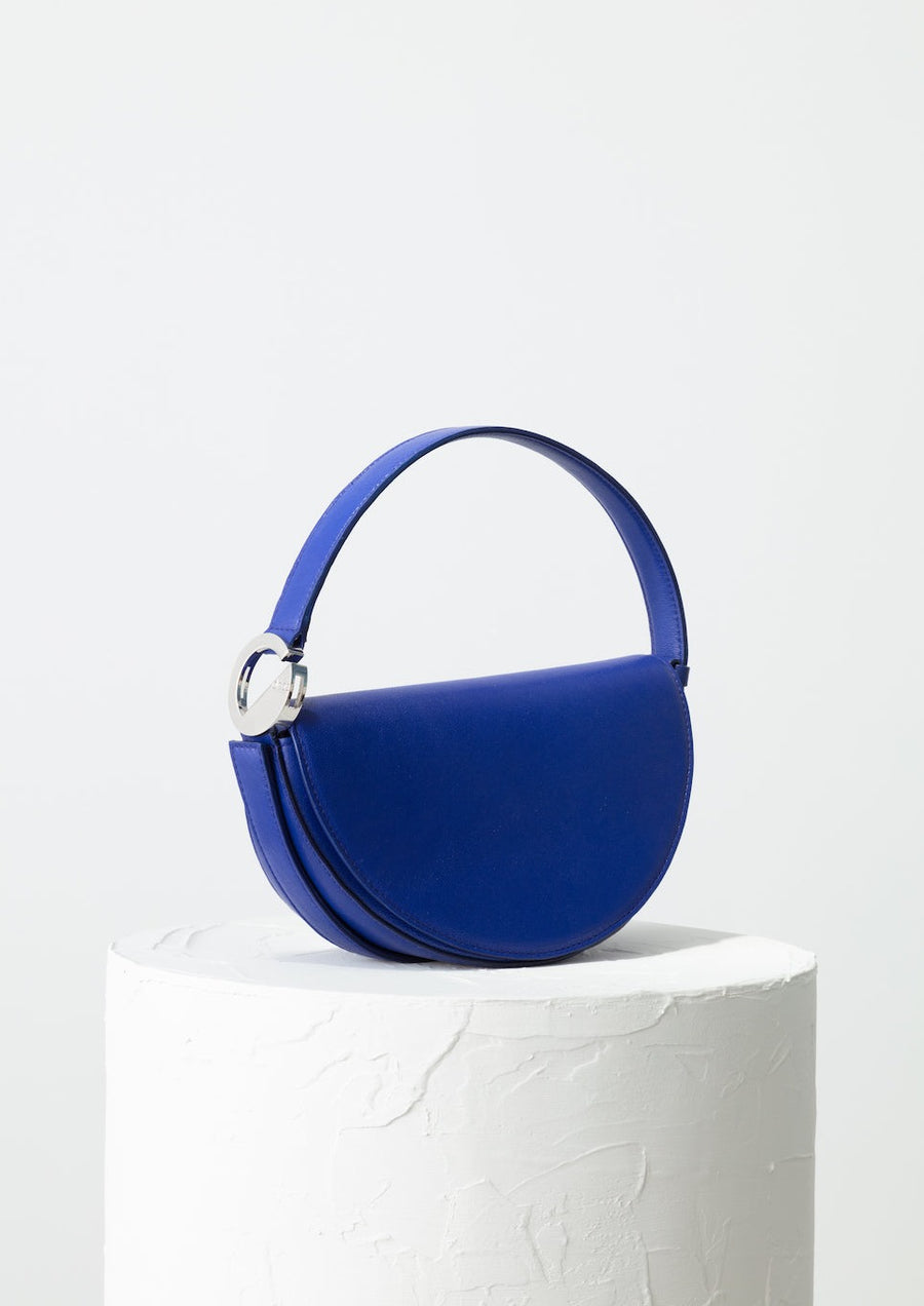 Dooz Aquarius cobalt leather crescent handbag short strap