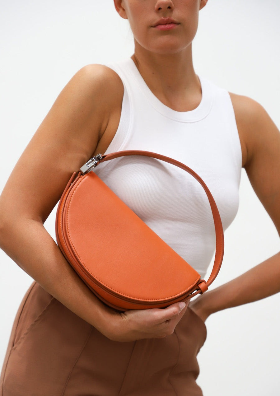 Dooz leo orange rust genuine italian leather handbag half moon circular shape with short strap