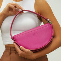 Dooz sagittarius zodiac leather purse hot pink color empowerment with astrological logo embossed on back pocket